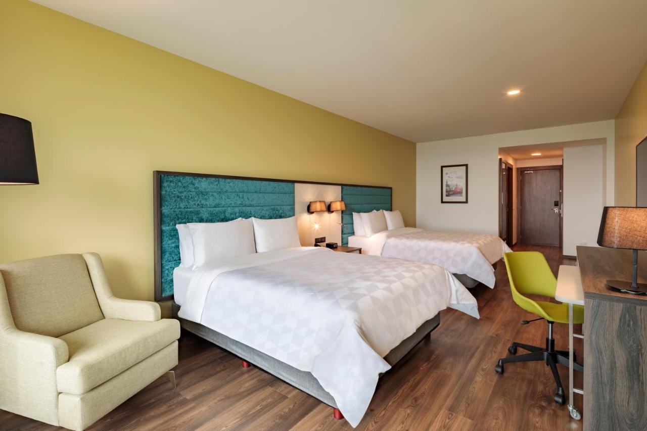 Holiday Inn - Quito Airport By Ihg تابابيلا المظهر الخارجي الصورة A typical room at the hotel